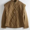 New & Other Stories Veste Matelassée à épaules Longues Beige foncé